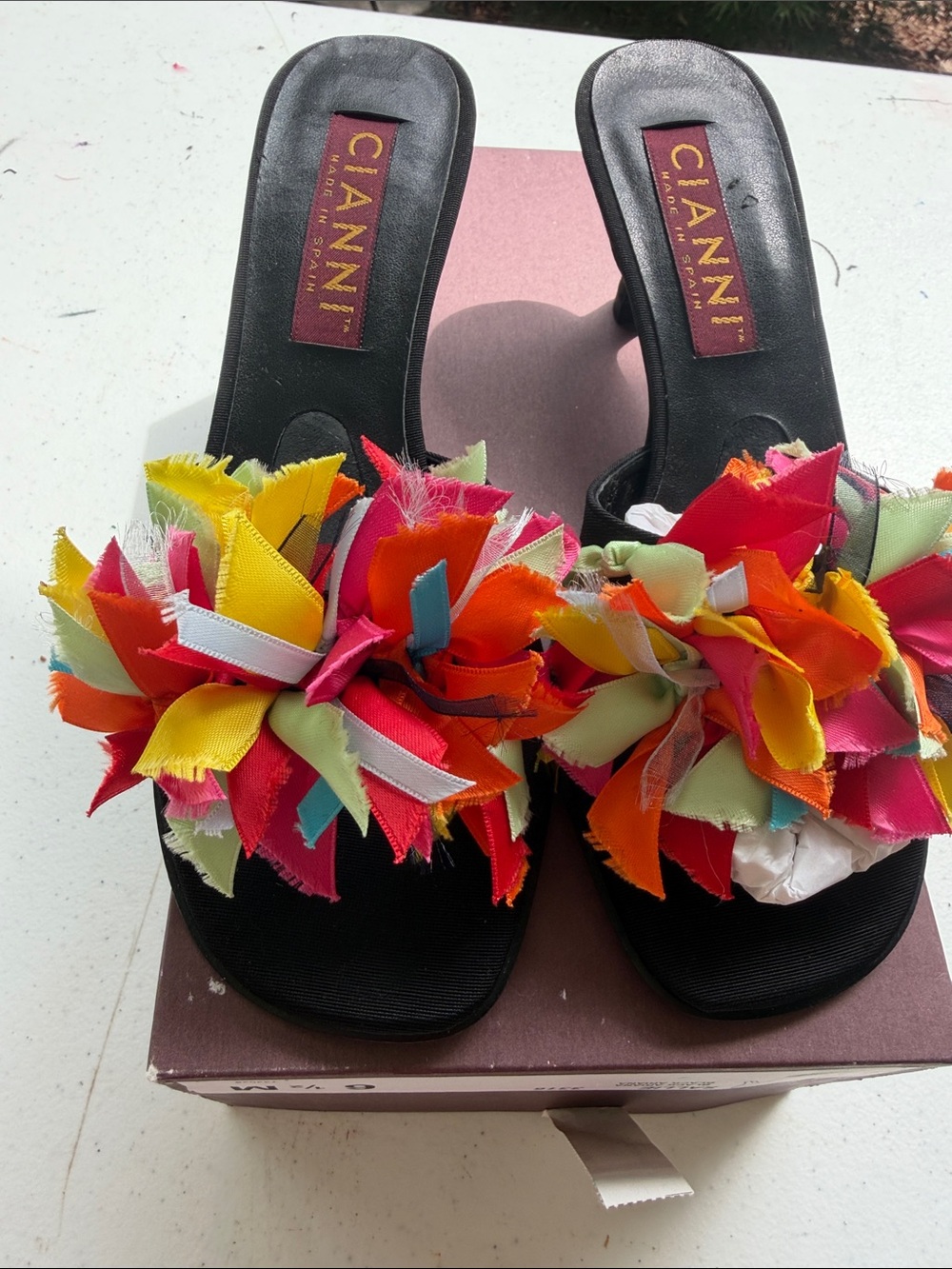 Cianni Black Slide Mules with Multicolor Ribbon Petal Accents